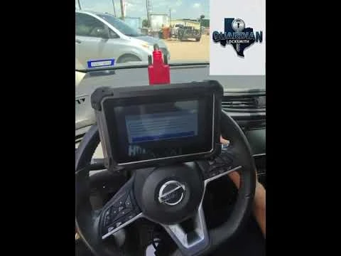 Nissan steering wheel and programming tablet from the Garland key replacement video