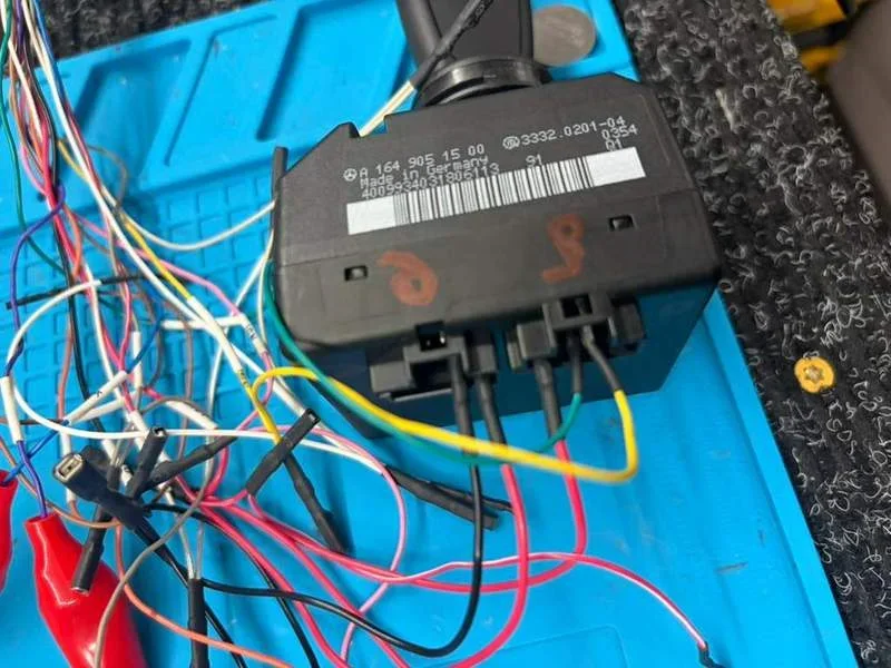 Vehicle electronic module connected to workshop wiring
